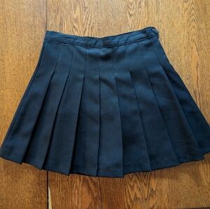 Black pleated tennis mini skirt